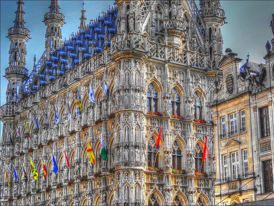 Leuven Grote Markt with the town hall and cafe terraces